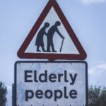 elderly people crossing road sign