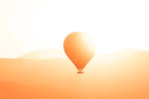 a hot air balloon flying in the sky